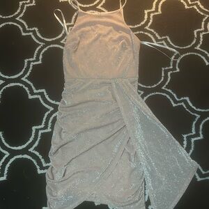 Short Pink Sparkly Dress- Size XS
Cross at the bottom, High on the neck